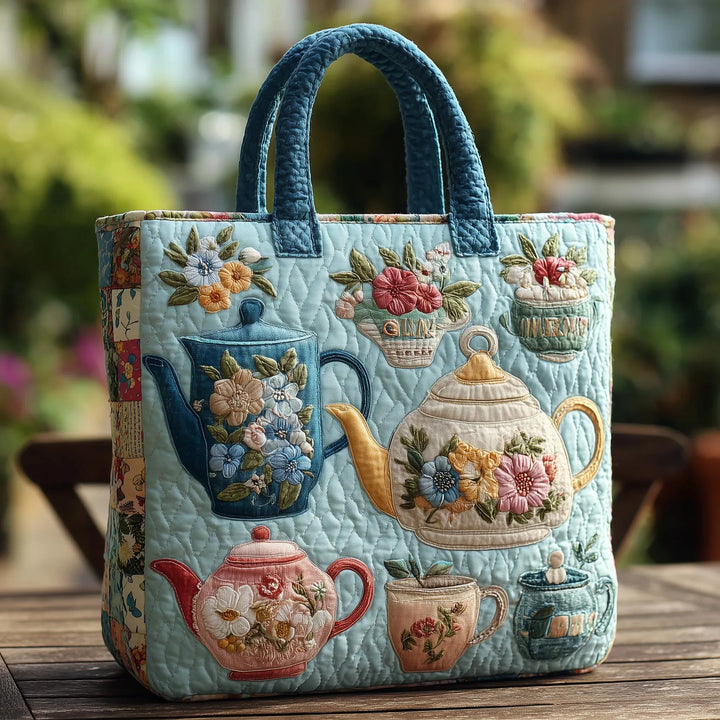 Blomsterprintet quiltet taske