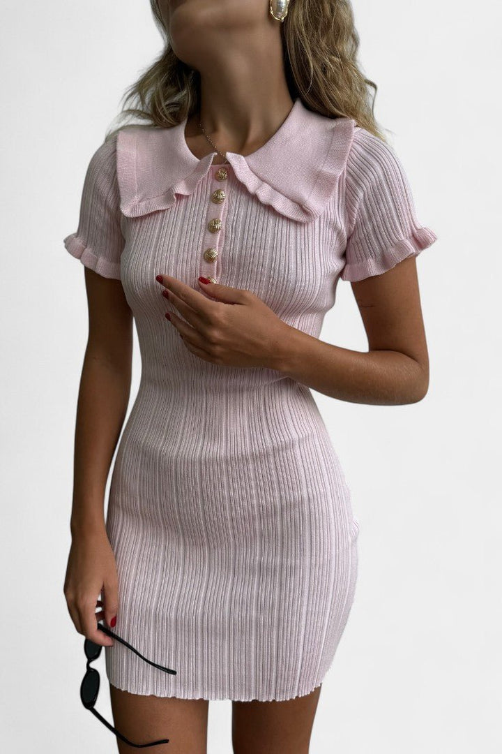 "Tanja | Strikket Kjole" can be rewritten as "Tanja | Strikket Kjole i Stilren Design".