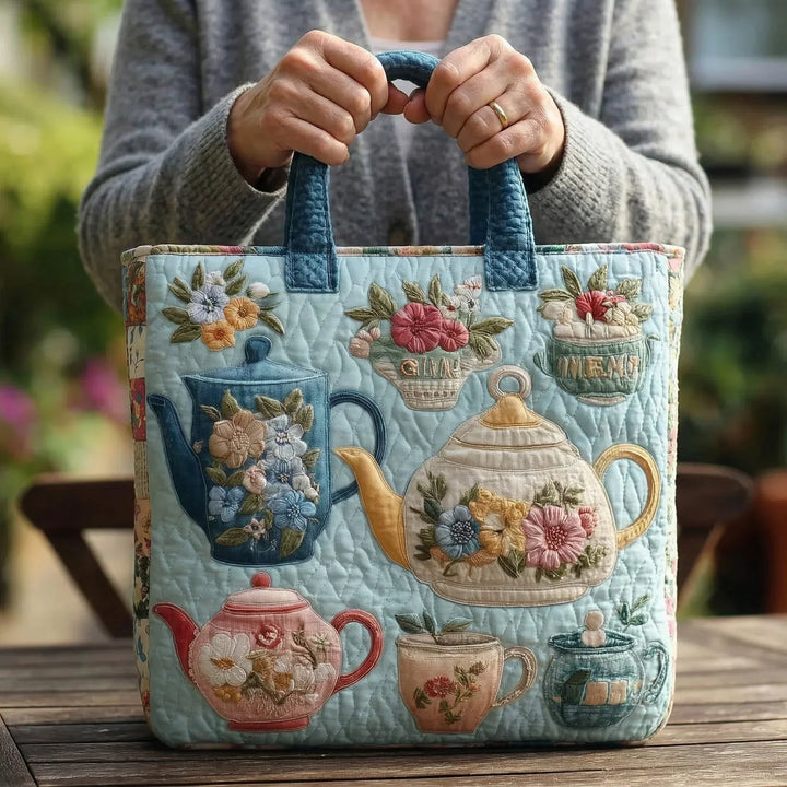 Blomsterprintet quiltet taske